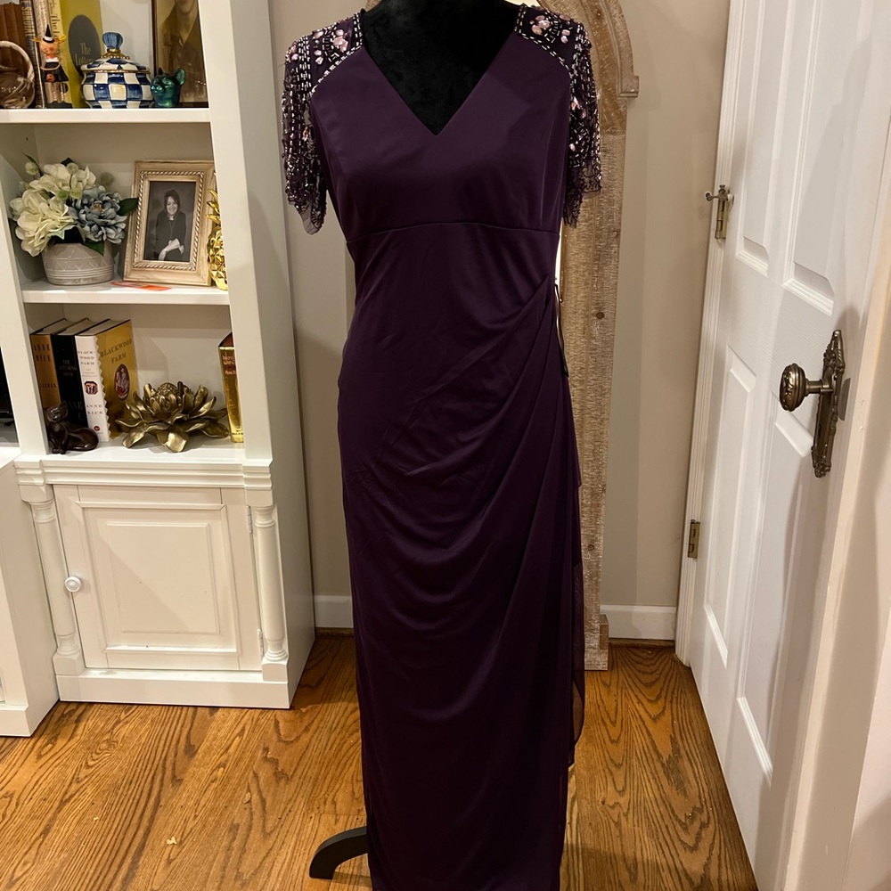 Xscape Gown with beaded sleeves. Color Eggplant/purple. Size 14p. NWT.